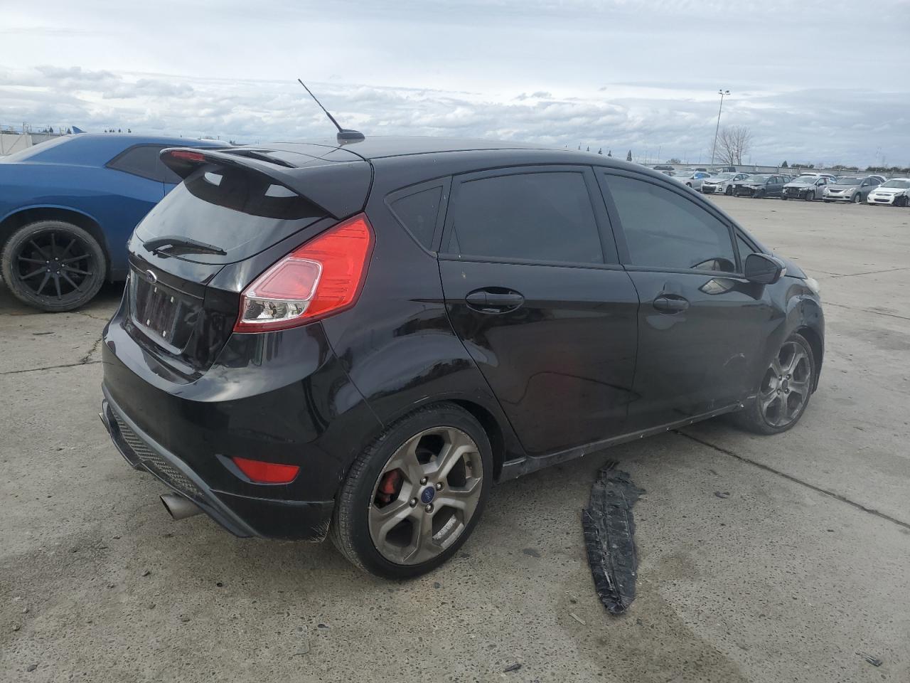 2016 Ford Fiesta VIN 3FADP4GX7GM165340 Copart auction photo, side / front end damage thumbnail 3