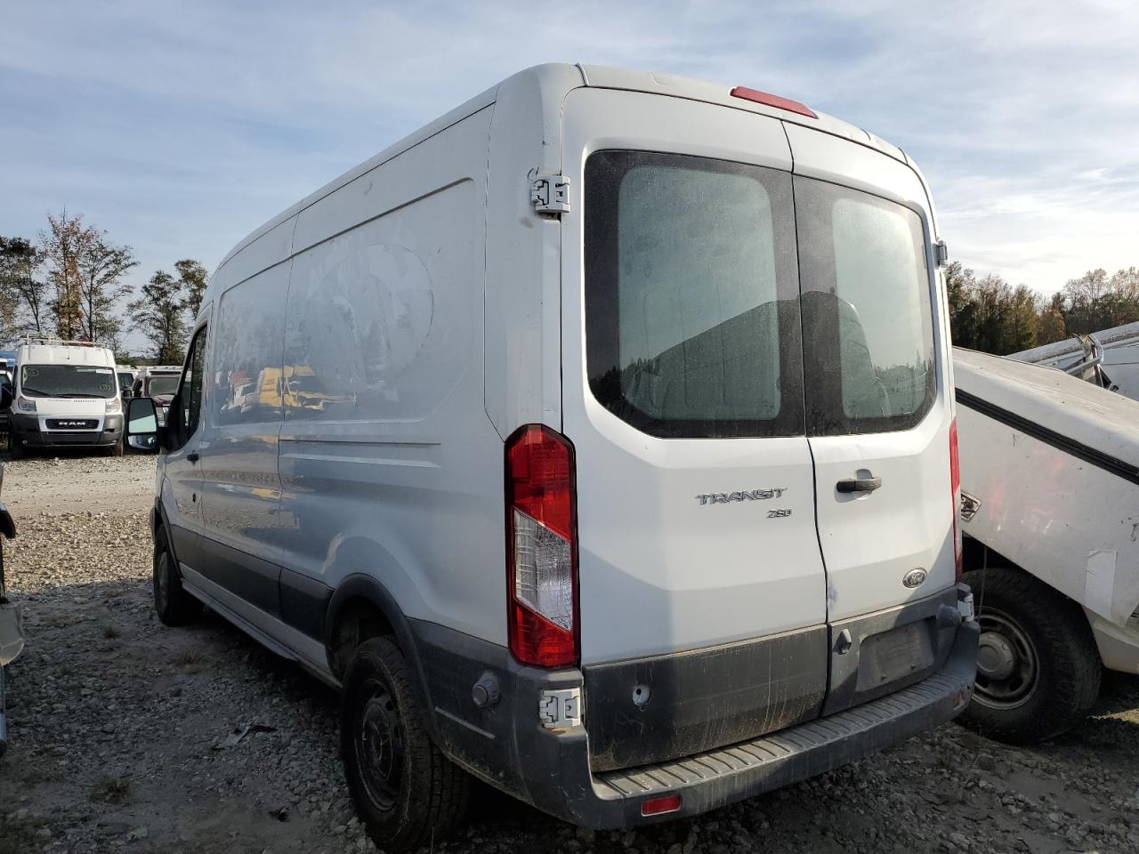 2016 Ford Transit VIN 1FTYR2CM2GKB17595 Copart auction photo, water/flood damage thumbnail 2