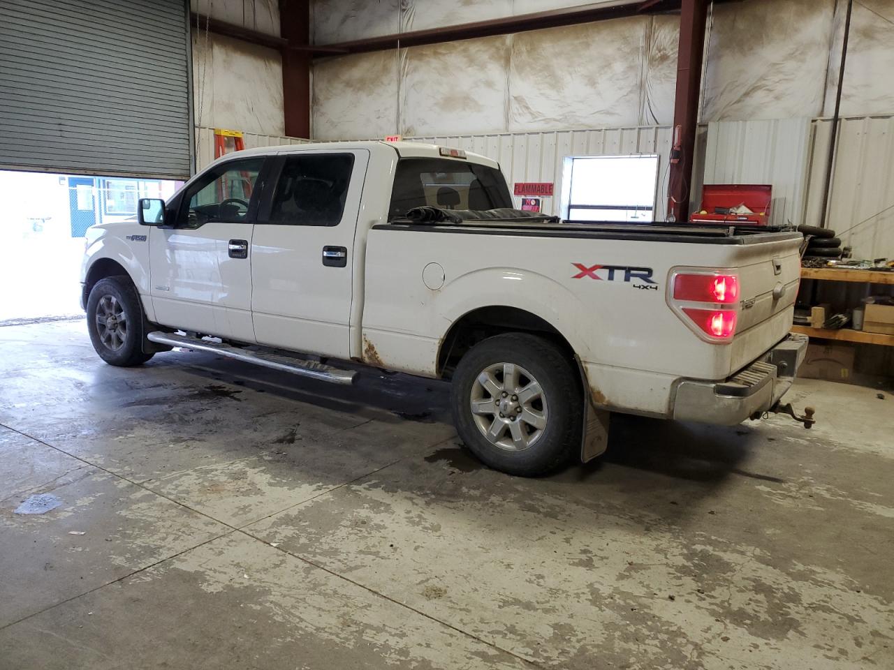 2014 Ford F-150 VIN 1FTFW1ET0EFC11298 Copart auction photo, side / rear end damage thumbnail 2