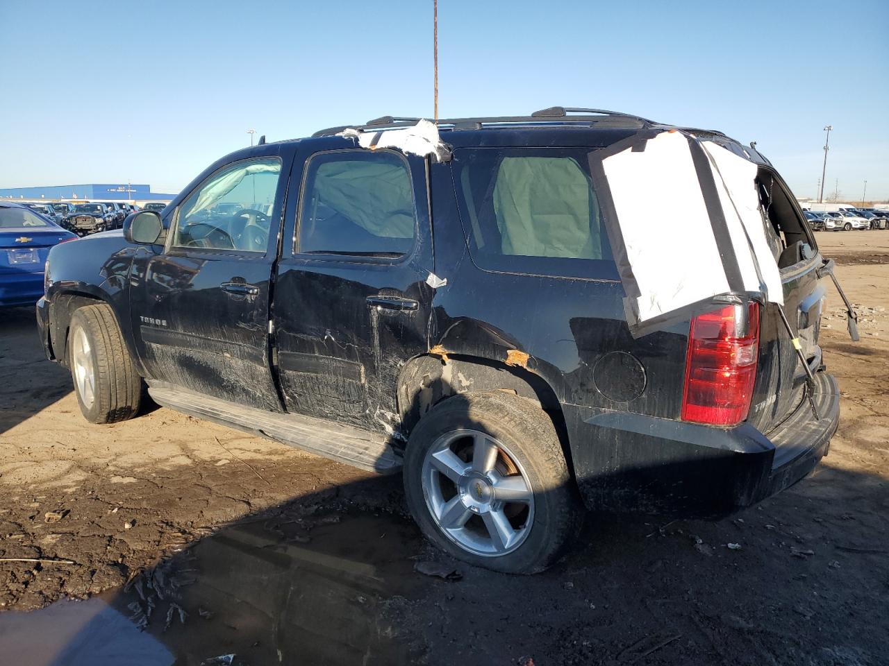 2011 Chevrolet Tahoe VIN 1GNSKAE07BR149450 Copart auction photo, side / rear end damage thumbnail 2
