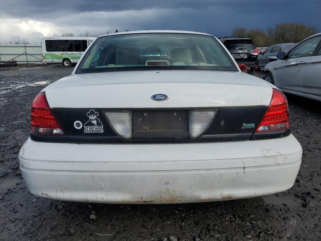 2011 Ford Crown Victoria VIN 2FABP7BVXBX157602 Copart auction photo, vandalism / stripped damage thumbnail 6