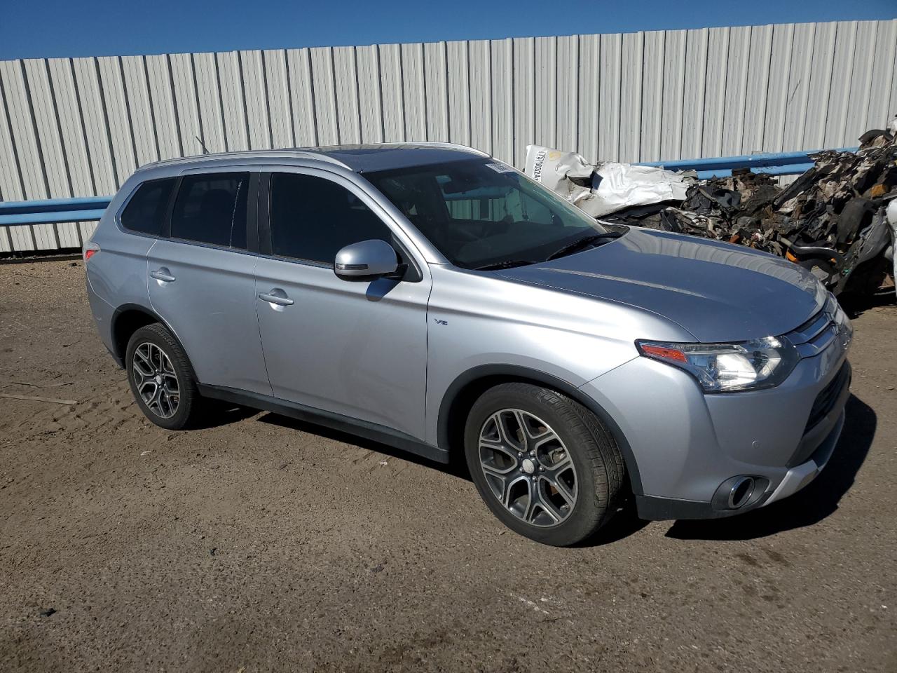 2015 Mitsubishi Outlander VIN JA4JZ4AX5FZ005710 Copart auction photo, side / undercarriage damage thumbnail 4