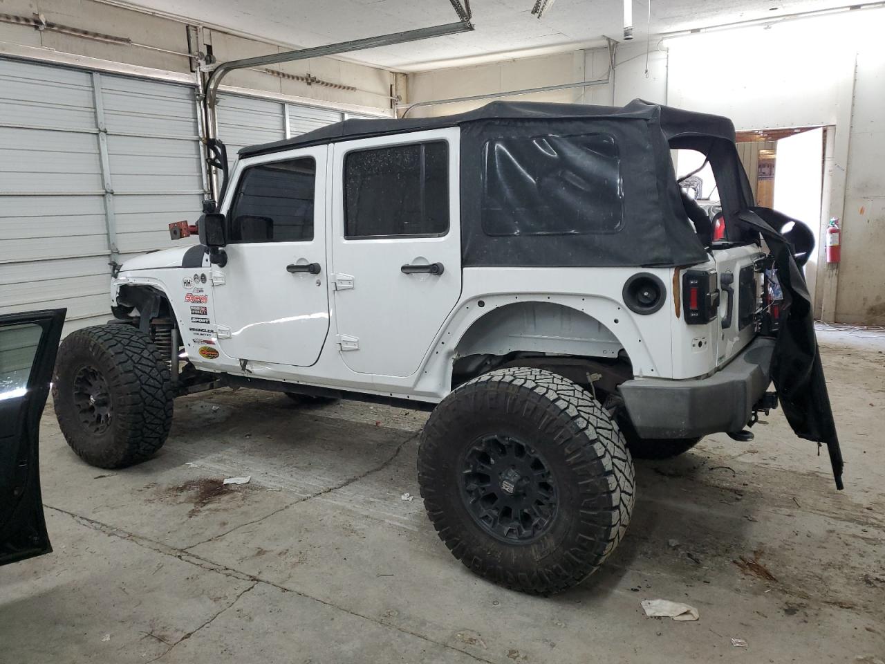 2015 Jeep Wrangler VIN 1C4BJWDG5FL608653 Copart auction photo, rollover damage thumbnail 2