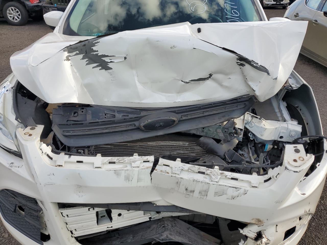 2015 Ford Escape VIN 1FMCU0G78FUC64231 Copart auction photo, front end damage thumbnail 13