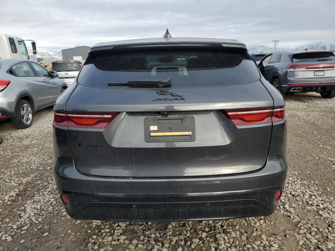 2023 Jaguar F-Pace VIN SADCJ2EX4PA710409 Copart auction photo, side damage thumbnail 6