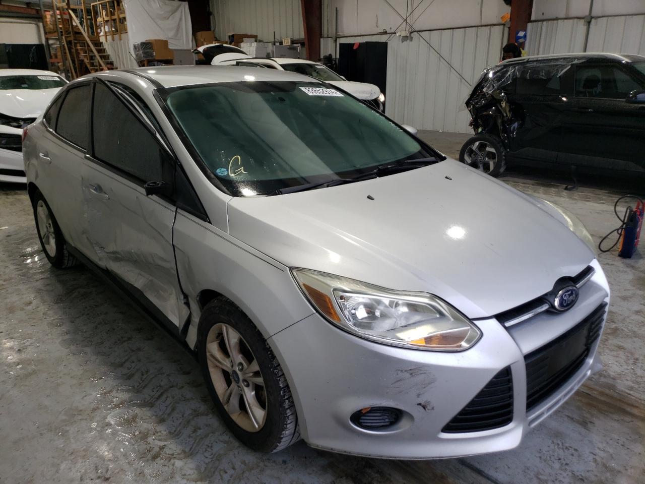 2014 Ford Focus VIN 1FADP3F21EL175733 Copart auction photo, side damage thumbnail 4