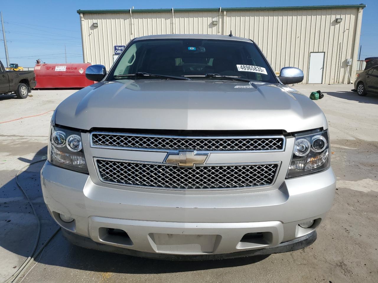 2009 Chevrolet Tahoe VIN 1GNFC330X9R292495 Copart auction photo, rear end / minor dent/scratches damage thumbnail 5
