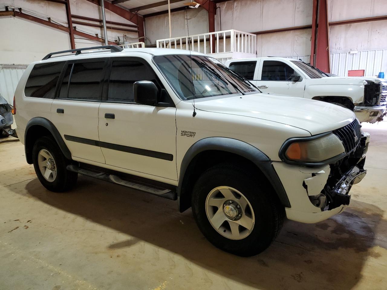 2003 Mitsubishi Montero VIN JA4LS21H23J005975 Copart auction photo, front end damage thumbnail 4