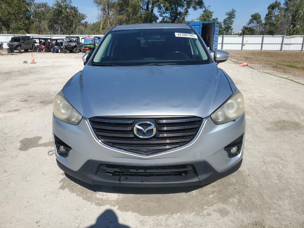 2016 Mazda CX-5 VIN JM3KE4DY5G0607708 Copart auction photo, side damage thumbnail 5