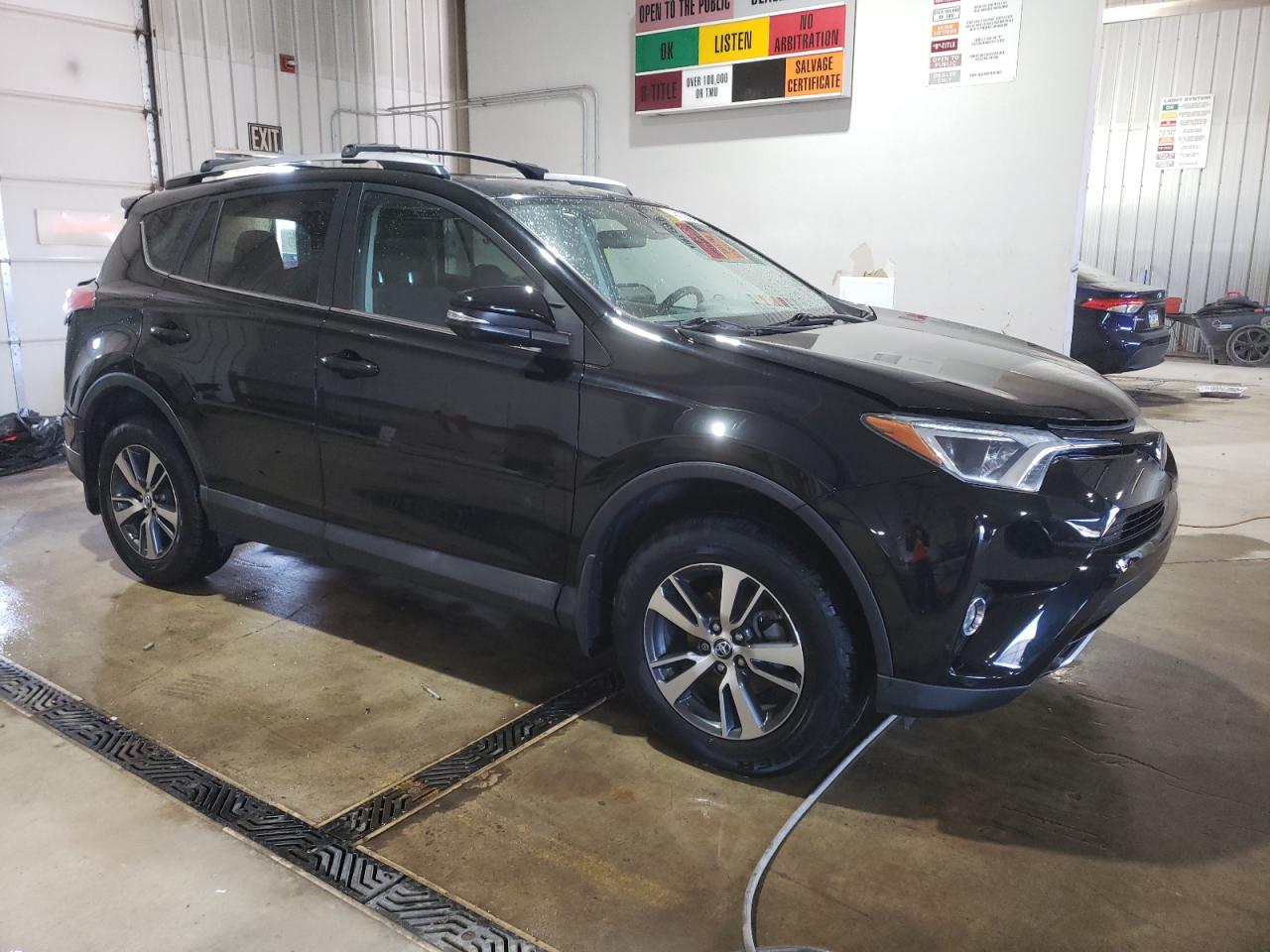 2018 Toyota RAV 4 VIN 2T3RFREV7JW712260 Copart auction photo, rear end damage thumbnail 4