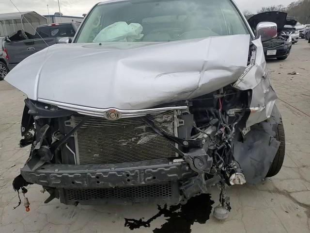 2010 Chrysler Town & Country VIN 2A4RR6DX0AR215399 Copart auction photo, front end / side damage thumbnail 12