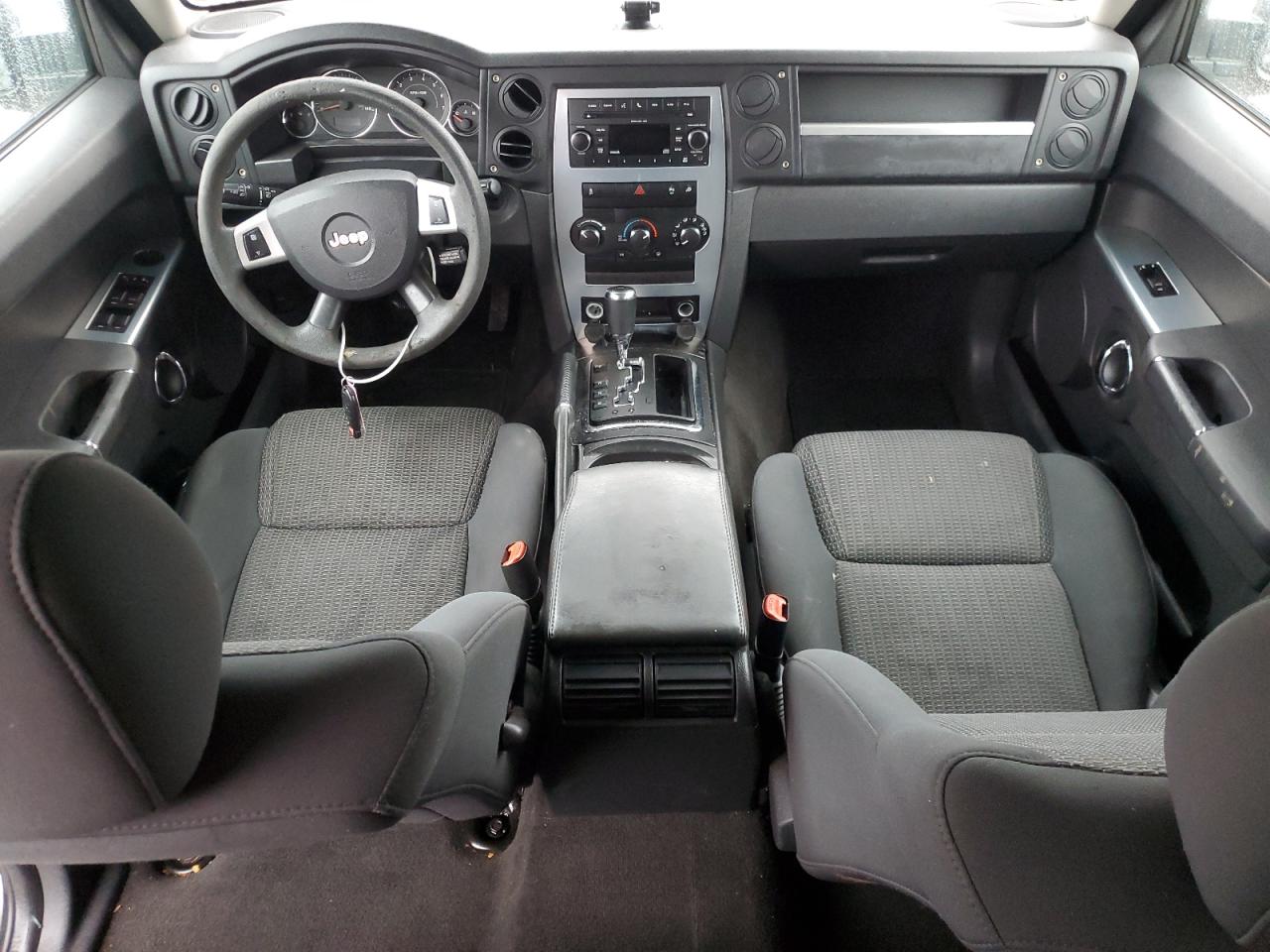 2010 Jeep Commander VIN 1J4RG4GK0AC128959 Copart auction photo, undercarriage / all over damage thumbnail 8