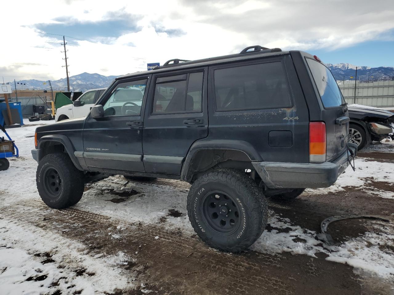 2000 Jeep Grand Cherokee VIN 1J4FF48S9YL205293 Copart auction photo, side / front end damage thumbnail 2