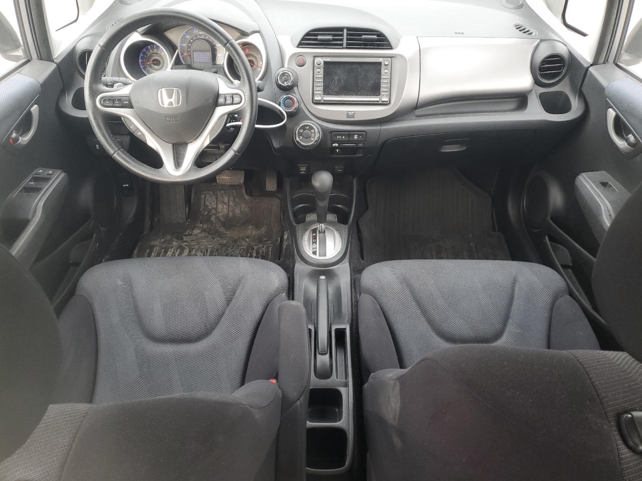 2009 Honda Fit VIN JHMGE88619S022774 Copart auction photo, rear end / minor dent/scratches damage thumbnail 8
