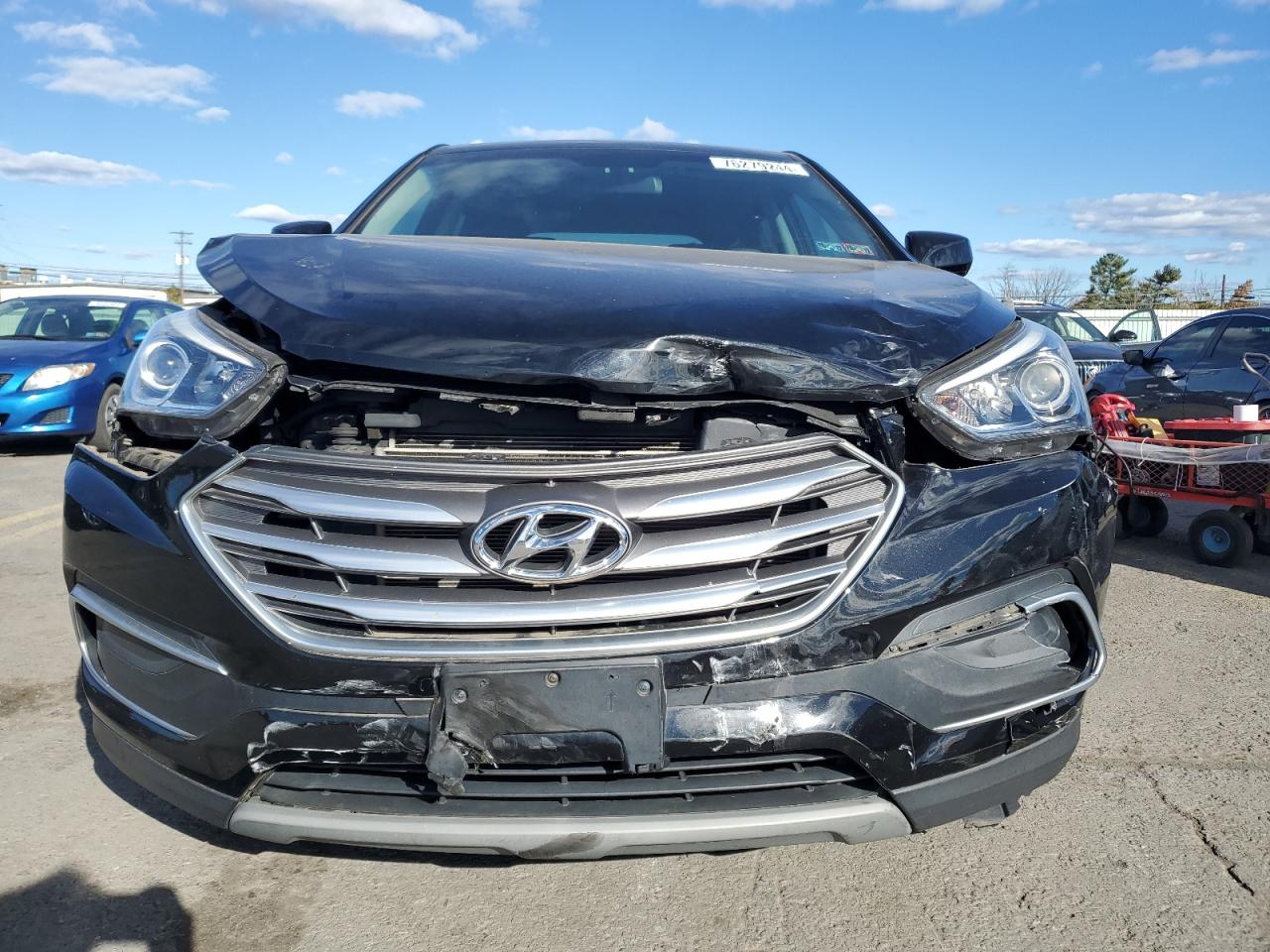 2018 Hyundai Santa Fe VIN 5NMZTDLB7JH087156 Copart auction photo, front end damage thumbnail 5