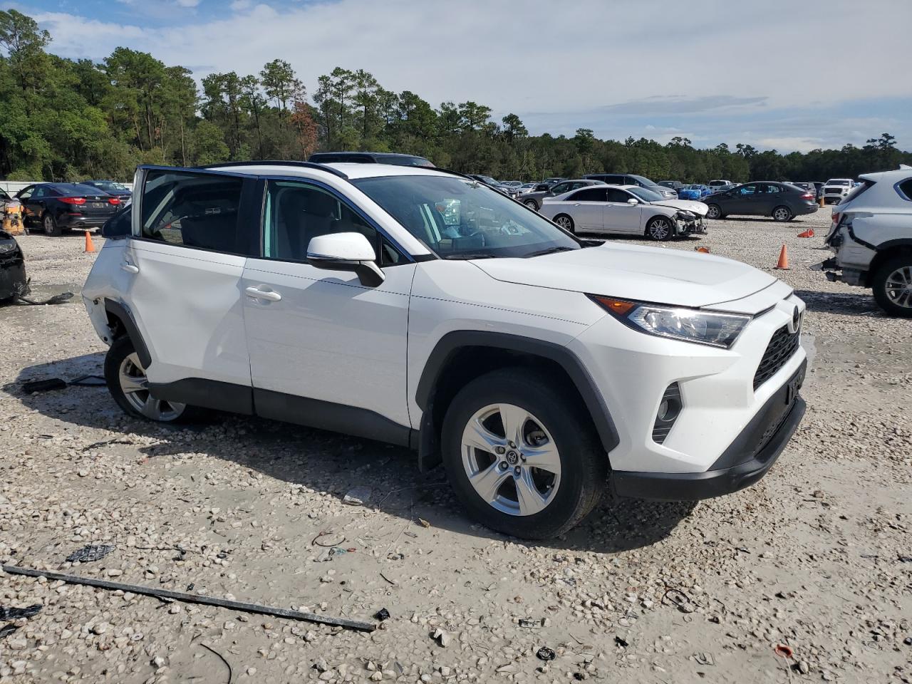 2021 Toyota RAV 4 VIN 2T3W1RFV5MC097259 Copart auction photo, rear end / side damage thumbnail 4
