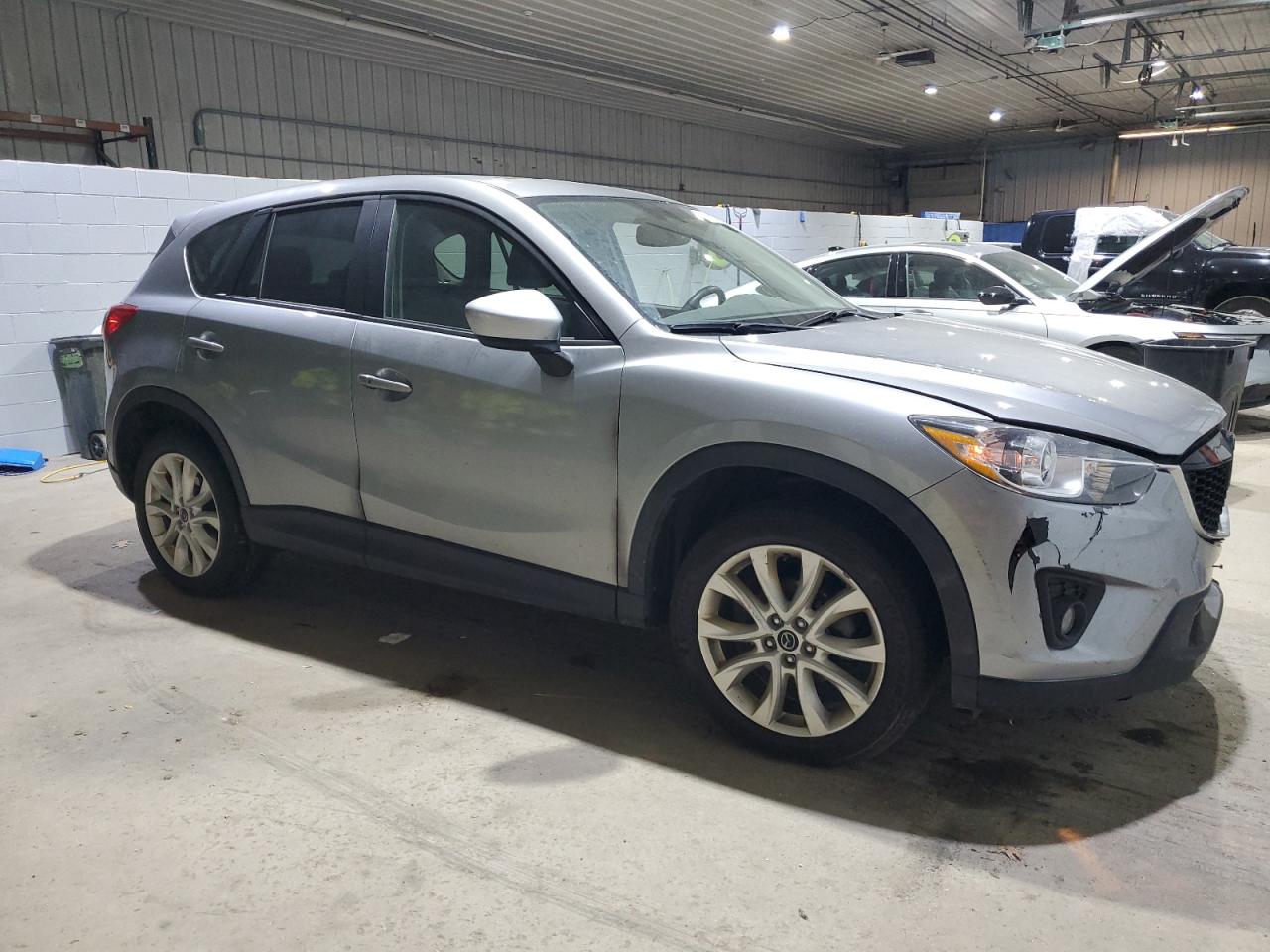 2013 Mazda CX-5 VIN JM3KE4DE1D0139185 Copart auction photo, front end / minor dent/scratches damage thumbnail 4