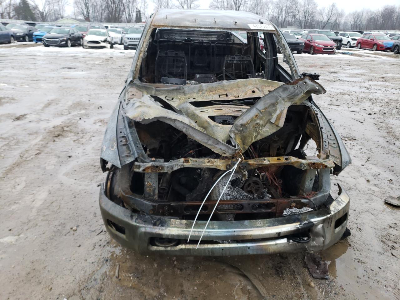 2010 Dodge RAM VIN 3D7UT2CL8AG130315 Copart auction photo, burn damage thumbnail 5