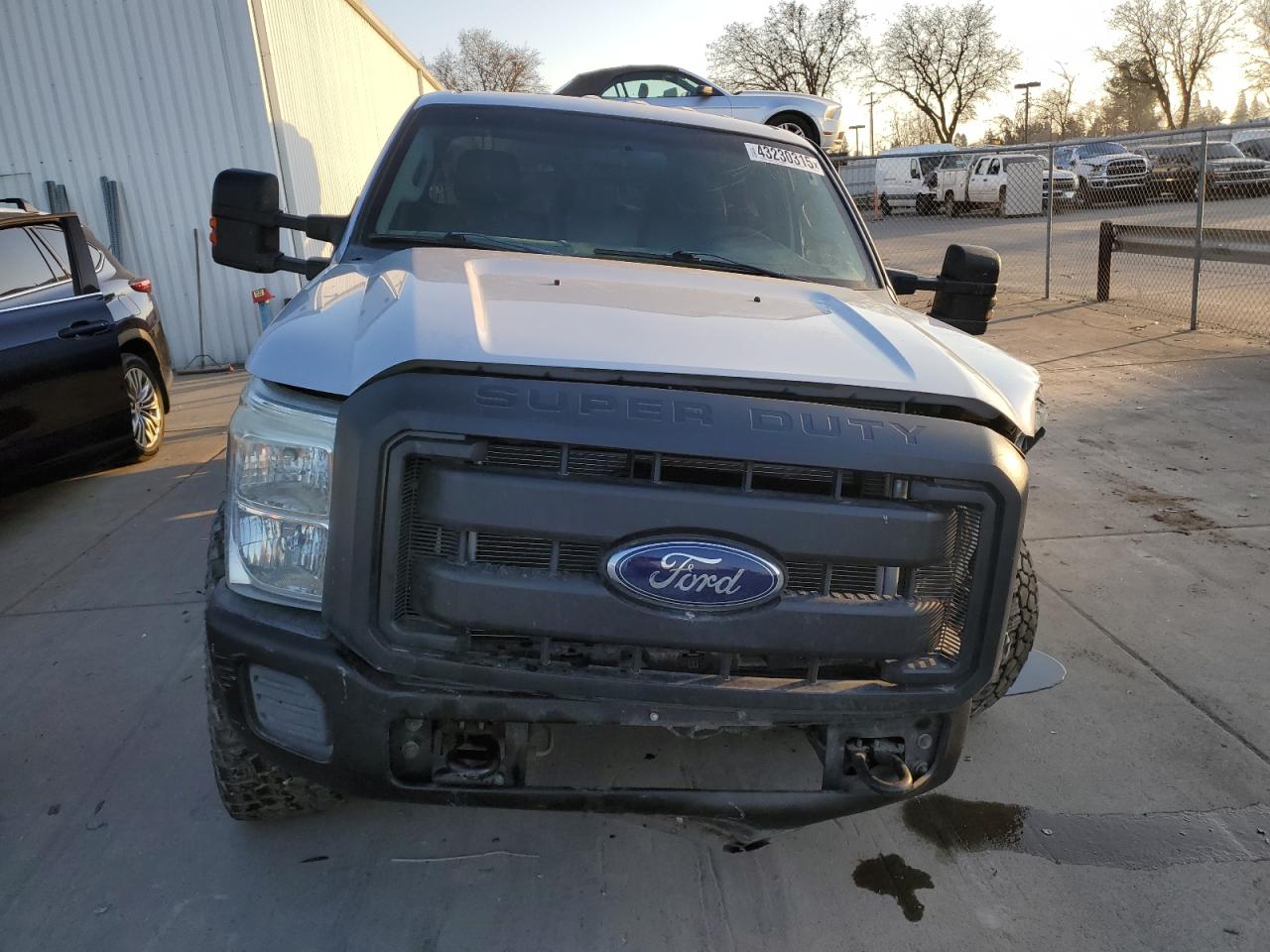 2011 Ford F250 VIN 1FT7W2BT1BEC63278 Copart auction photo, front end / rear end damage thumbnail 5