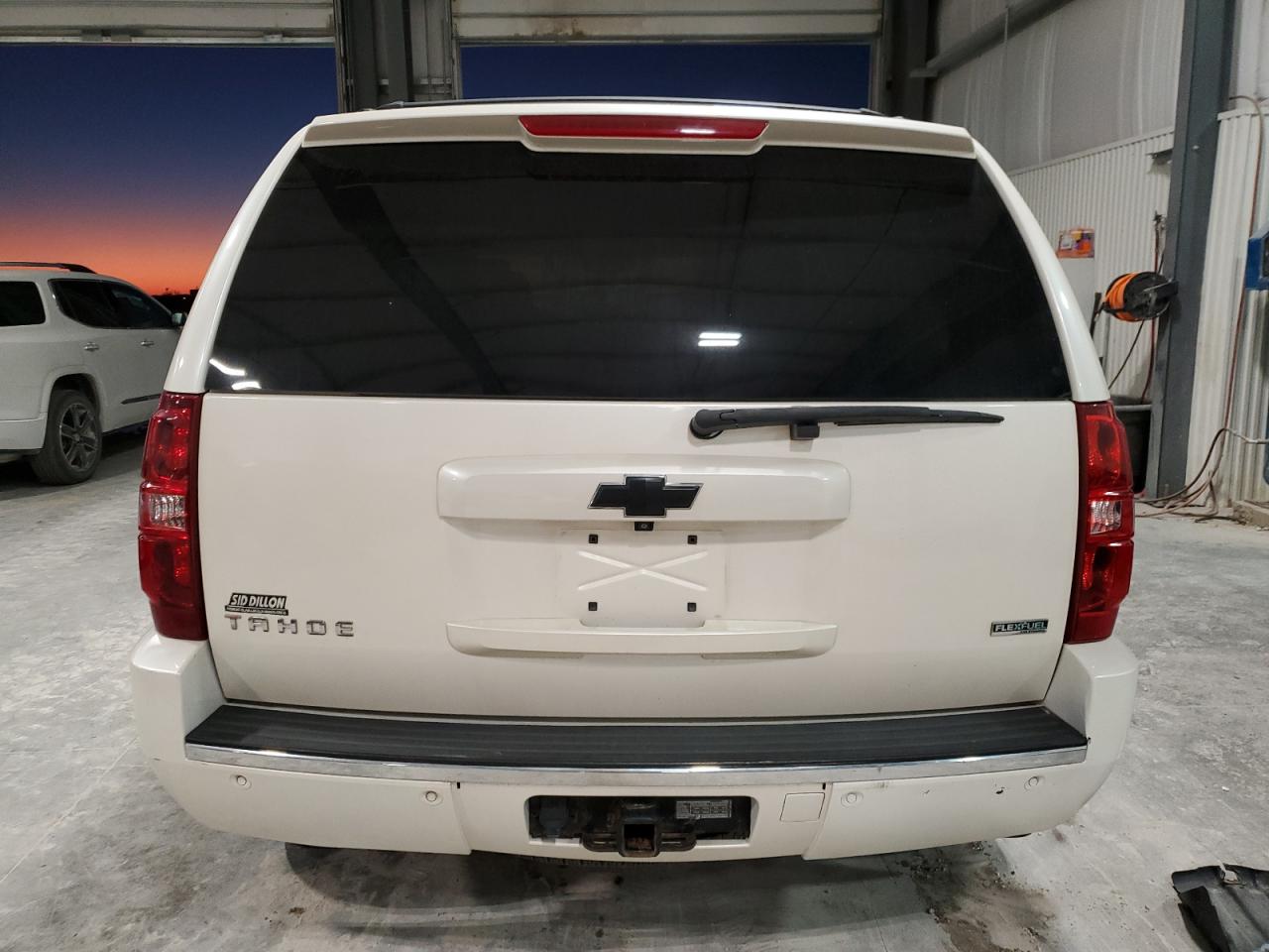 2010 Chevrolet Tahoe VIN 1GNUKCE02AR145227 Copart auction photo, front end damage thumbnail 6