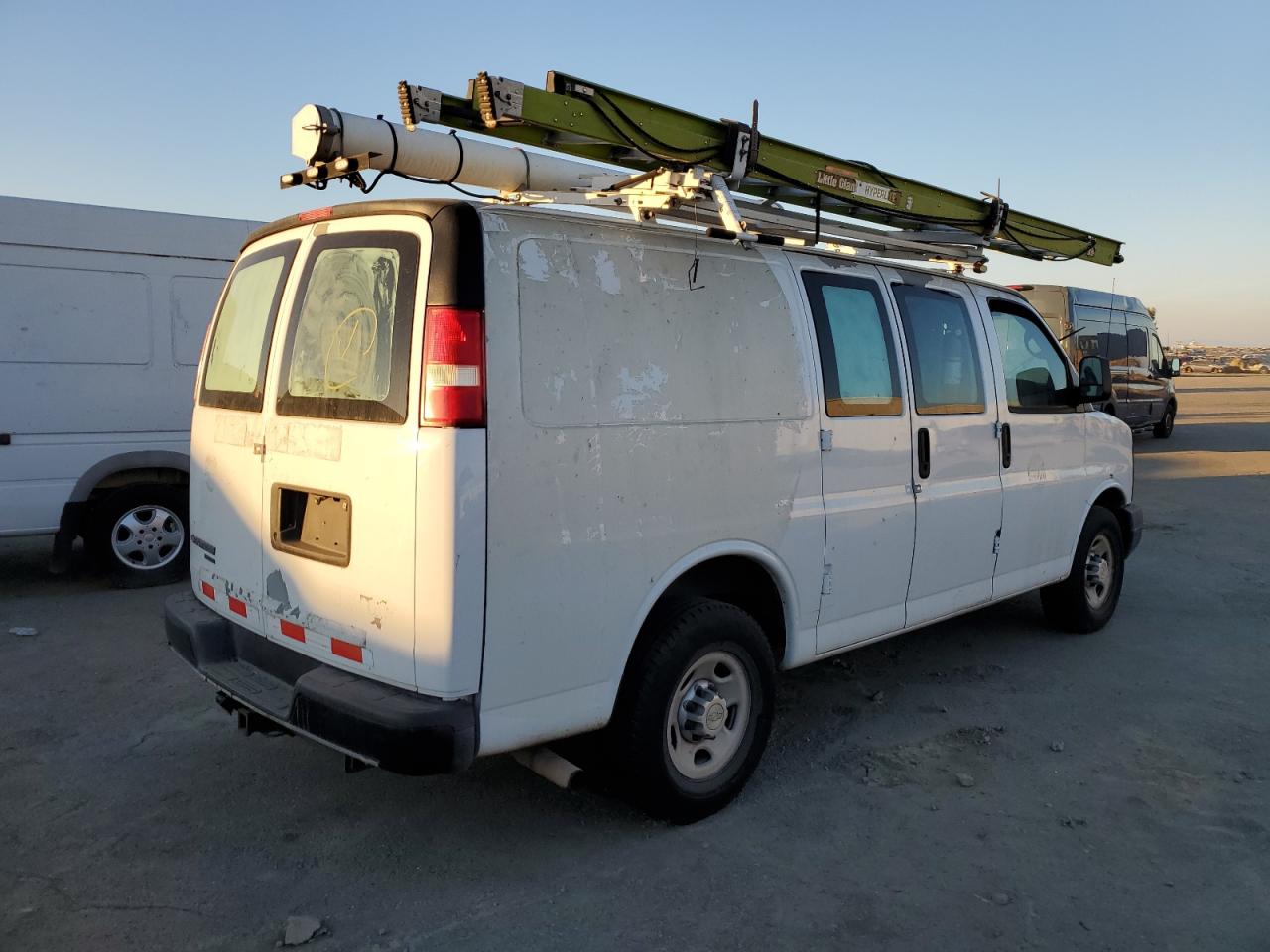 2012 Chevrolet Express VIN 1GCWGFCG1C1196207 Copart auction photo, minor dent/scratches damage thumbnail 3