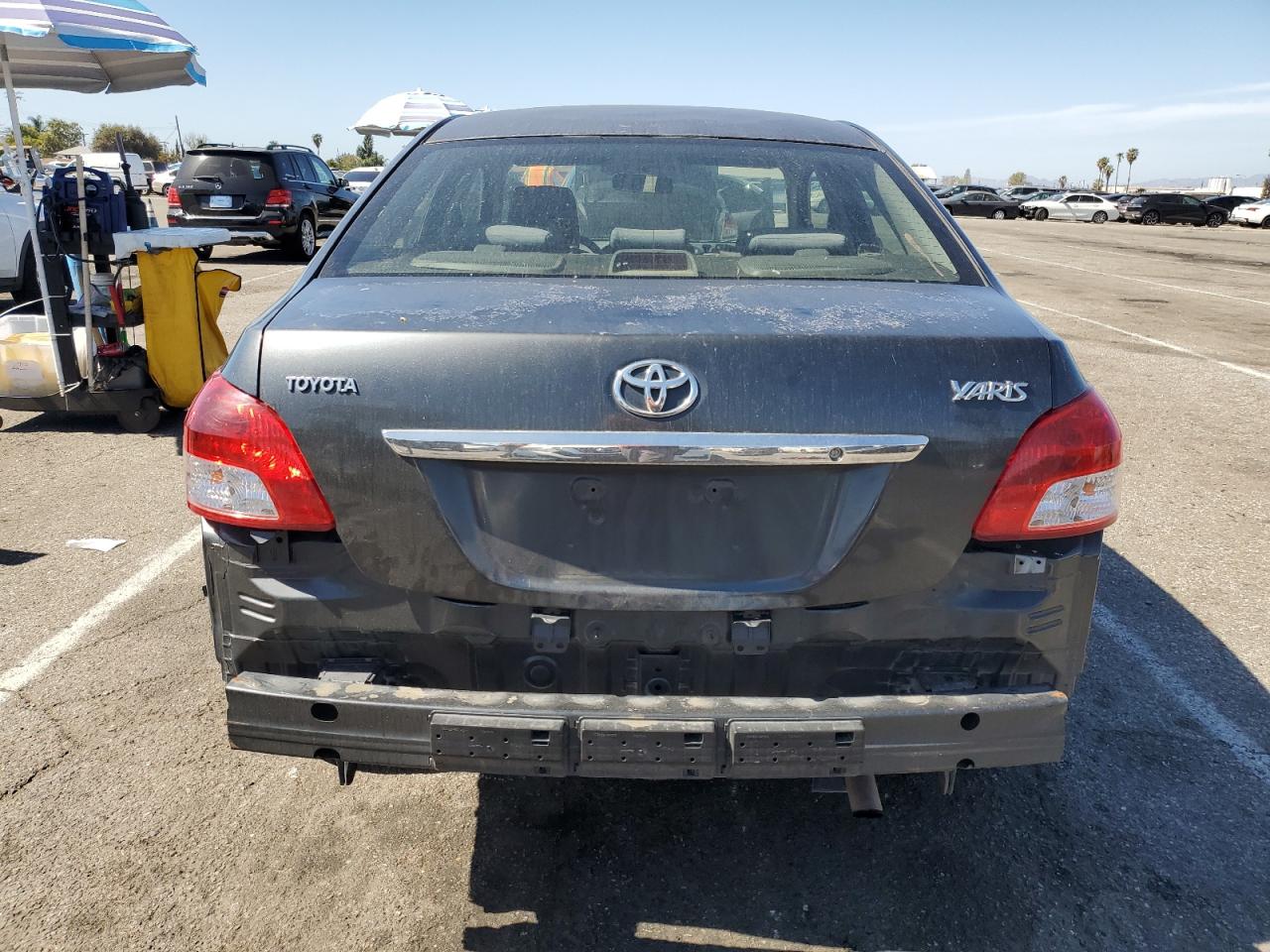 2009 Toyota Yaris VIN JTDBT903694051524 Copart auction photo, front end / rear end damage thumbnail 6