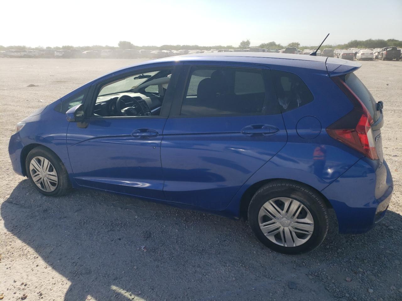 2019 Honda Fit VIN 3HGGK5H46KM737539 Copart auction photo, side / minor dent/scratches damage thumbnail 2