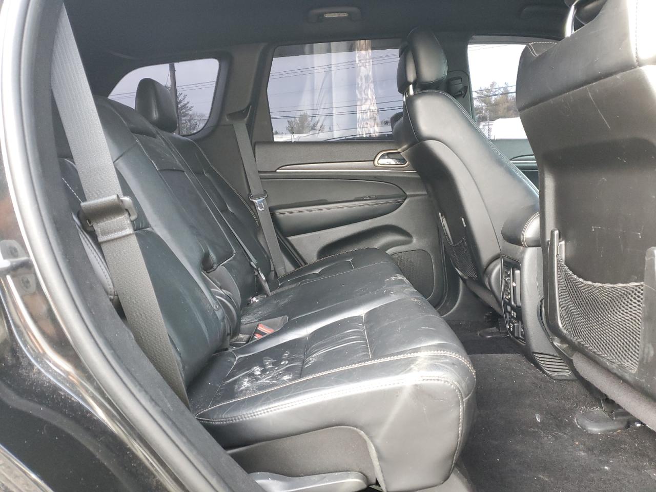 2015 Jeep Grand Cherokee VIN 1C4RJFBG7FC704625 Copart auction photo, vandalism damage thumbnail 12