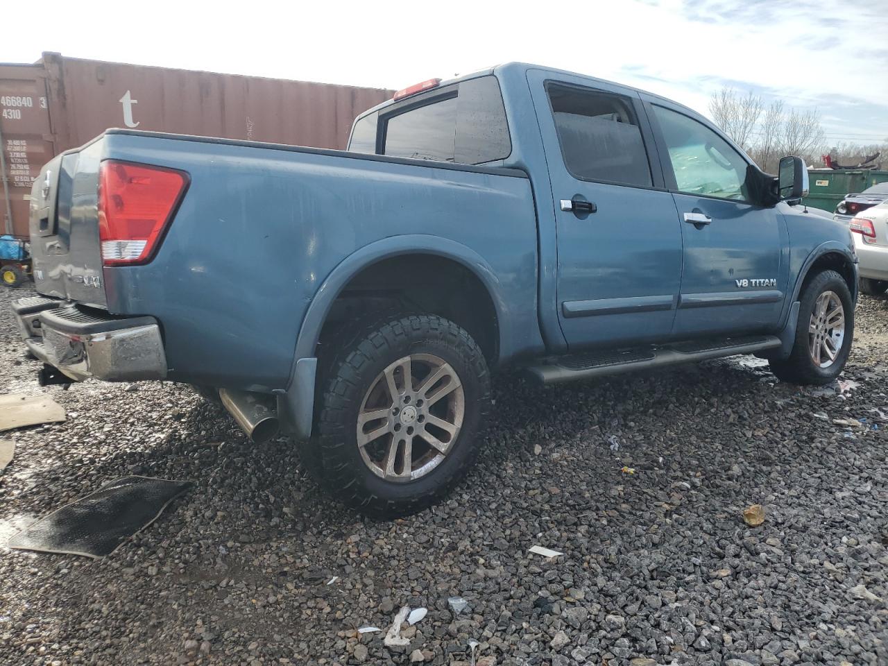 2011 Nissan Titan VIN 1N6BA0ECXBN302004 Copart auction photo, front end / side damage thumbnail 3