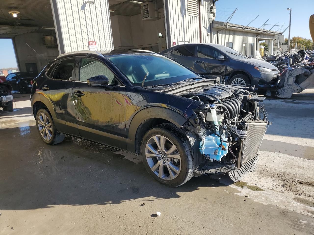 2022 Mazda CX-30 VIN 3MVDMBBL8NM427034 Copart auction photo, front end / minor dent/scratches damage thumbnail 4