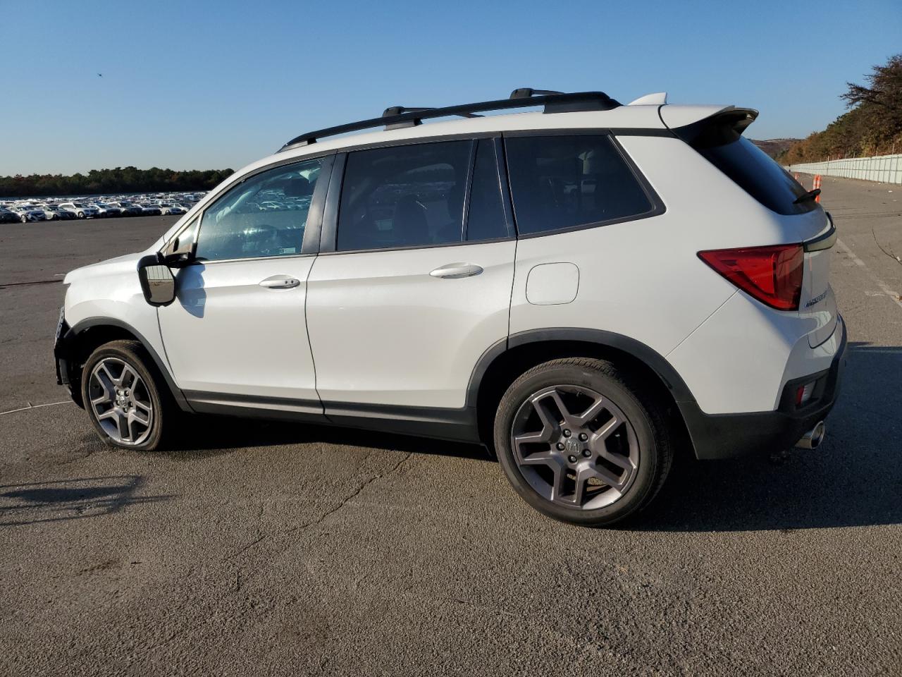2022 Honda Passport VIN 5FNYF8H55NB003534 Copart auction photo, front end / minor dent/scratches damage thumbnail 2