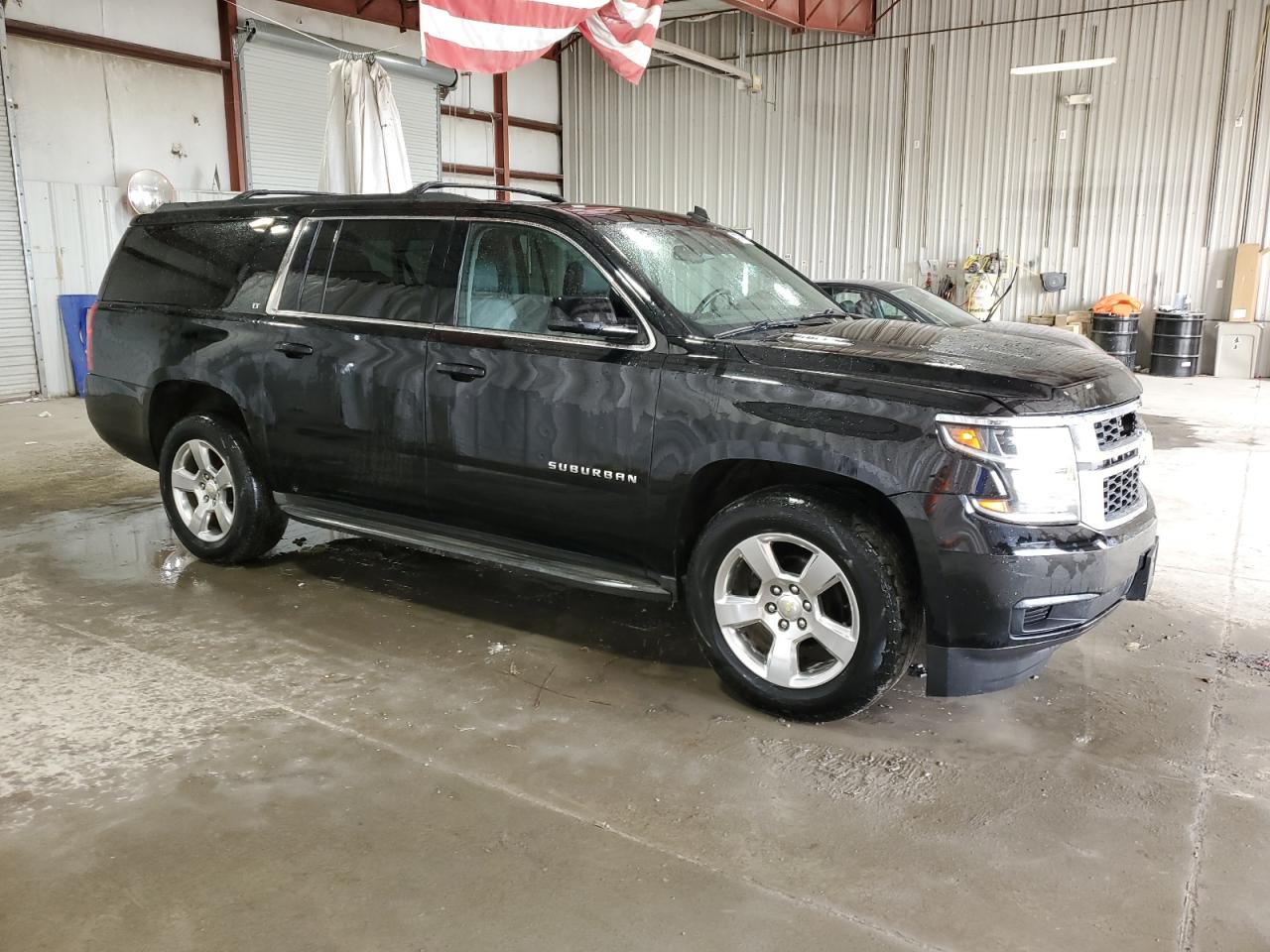 2015 Chevrolet Suburban VIN 1GNSKJKC9FR197178 Copart auction photo, front end damage thumbnail 4