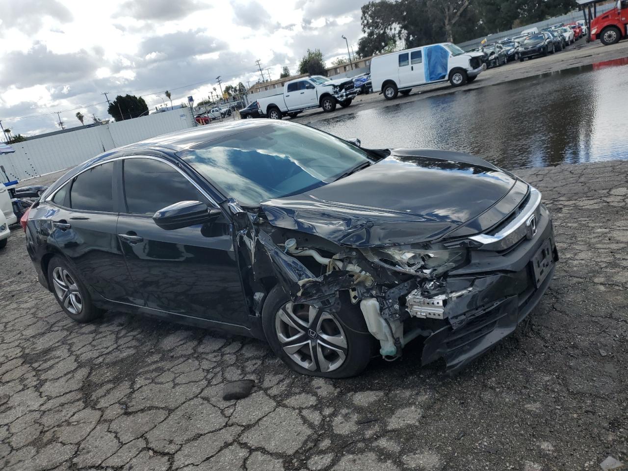 2018 Honda Civic VIN 2HGFC2F5XJH530605 Copart auction photo, front end / minor dent/scratches damage thumbnail 4
