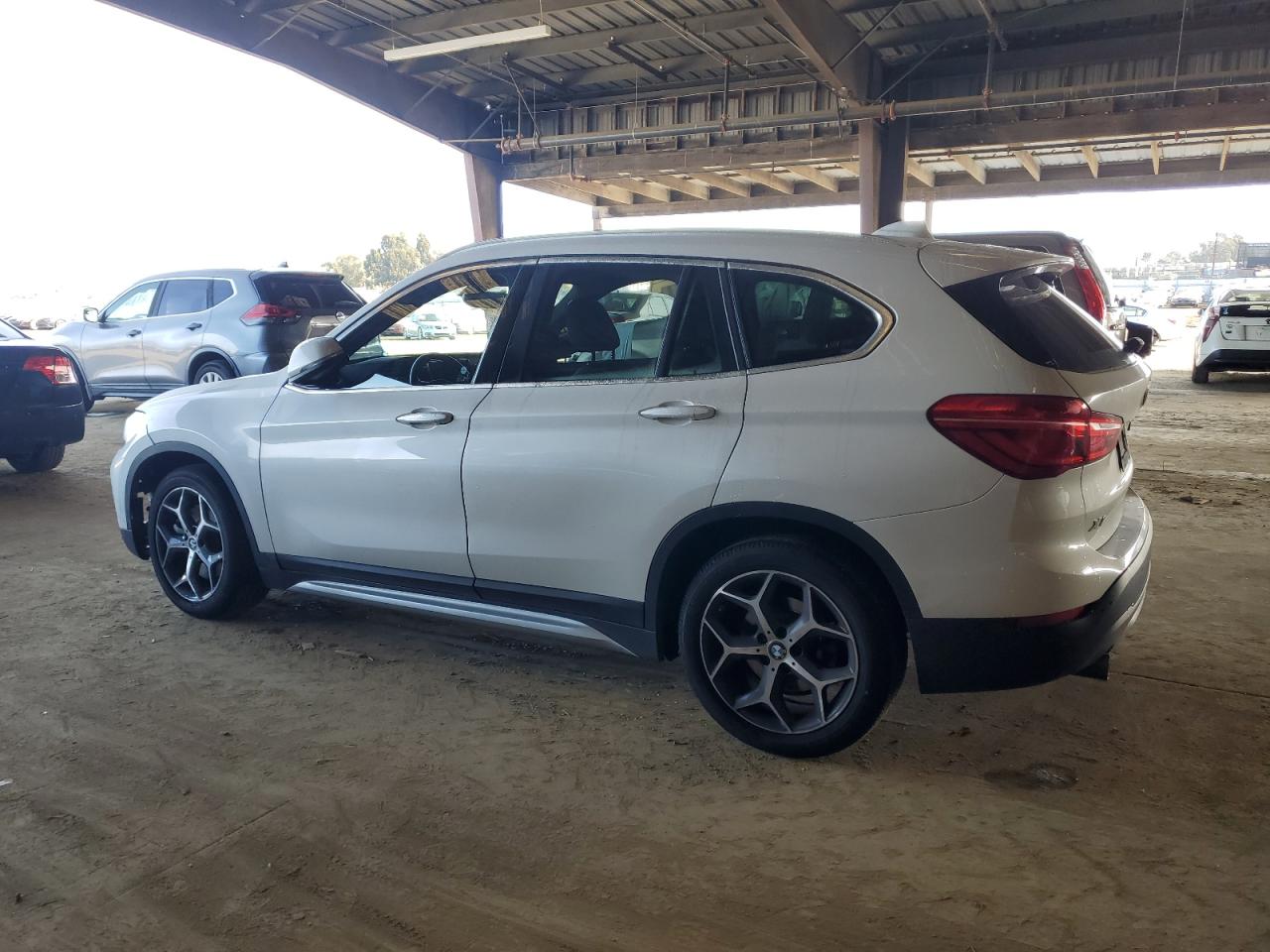 2019 BMW X1 VIN WBXHT3C55K5L90590 Copart auction photo, mechanical / front end damage thumbnail 2