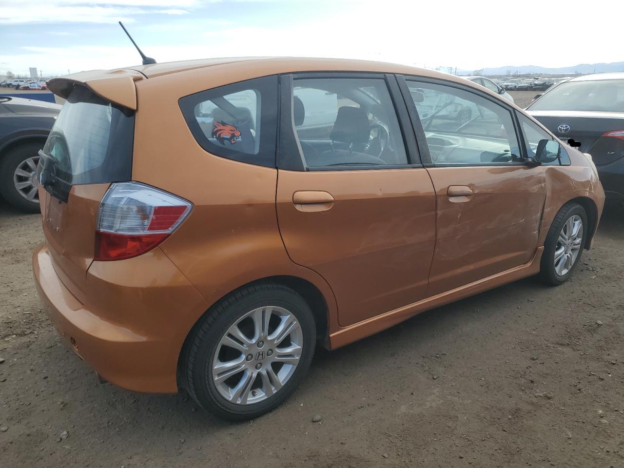 2009 Honda Fit VIN JHMGE88479S059634 Copart auction photo, front end / hail damage thumbnail 3