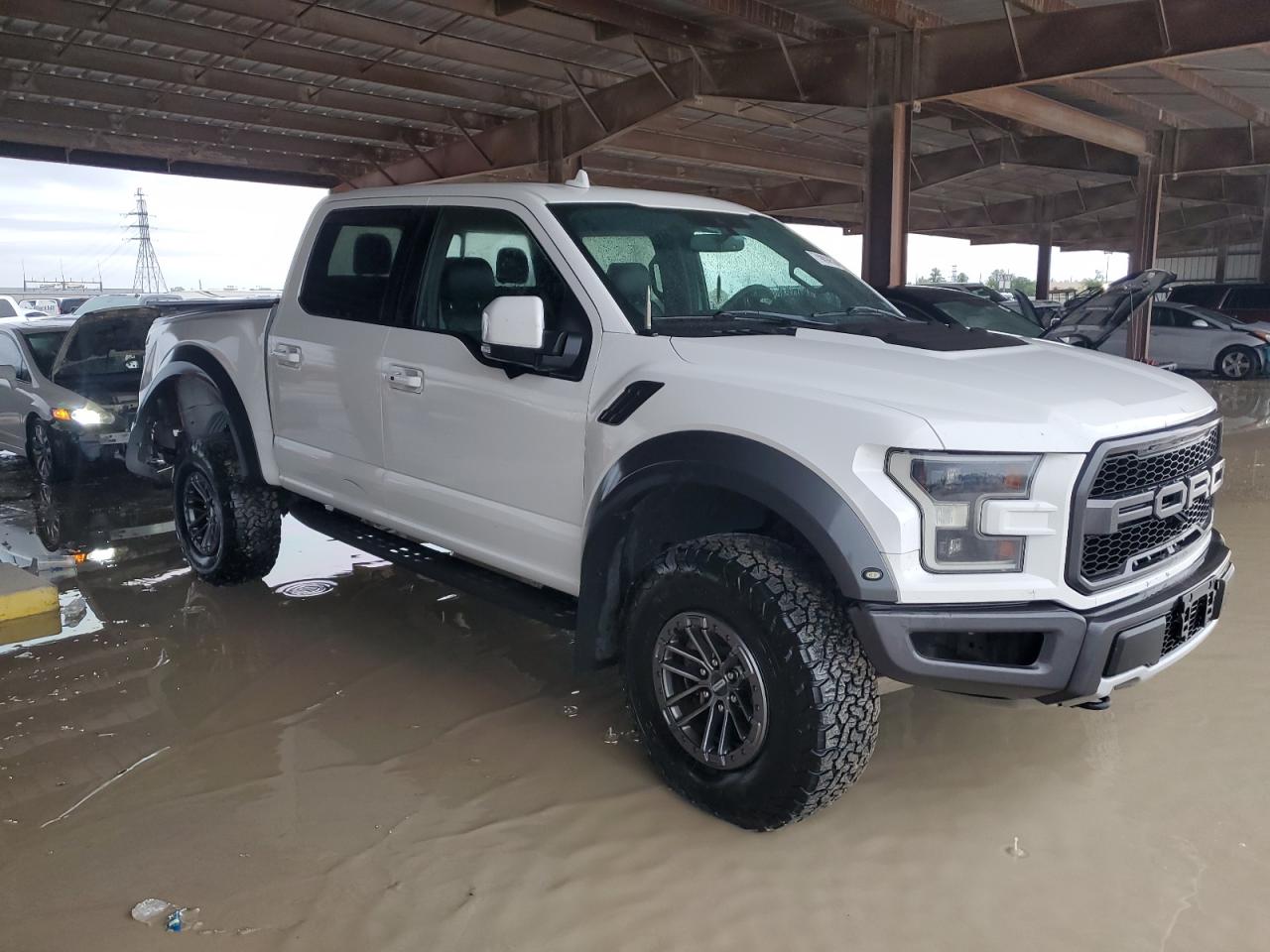 2019 Ford F-150 VIN 1FTFW1RG7KFB24930 Copart auction photo, rear end damage thumbnail 4