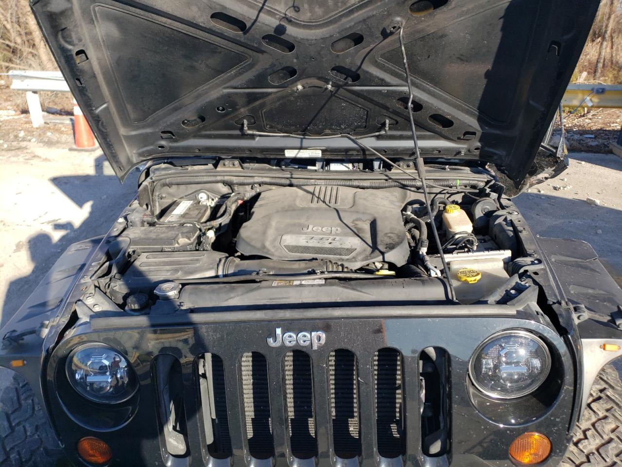 2013 Jeep Wrangler VIN 1C4HJWDG1DL654391 Copart auction photo, all over damage thumbnail 12