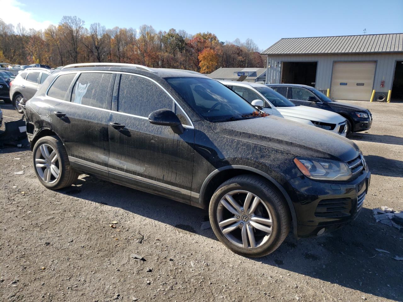 2014 Volkswagen Touareg VIN WVGEP9BP9ED011722 Copart auction photo, rear end damage thumbnail 4