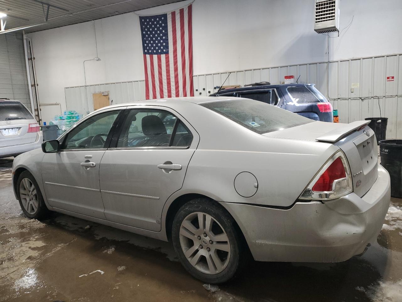 2009 Ford Fusion VIN 3FAHP08159R162446 Copart auction photo, rear end / undercarriage damage thumbnail 2