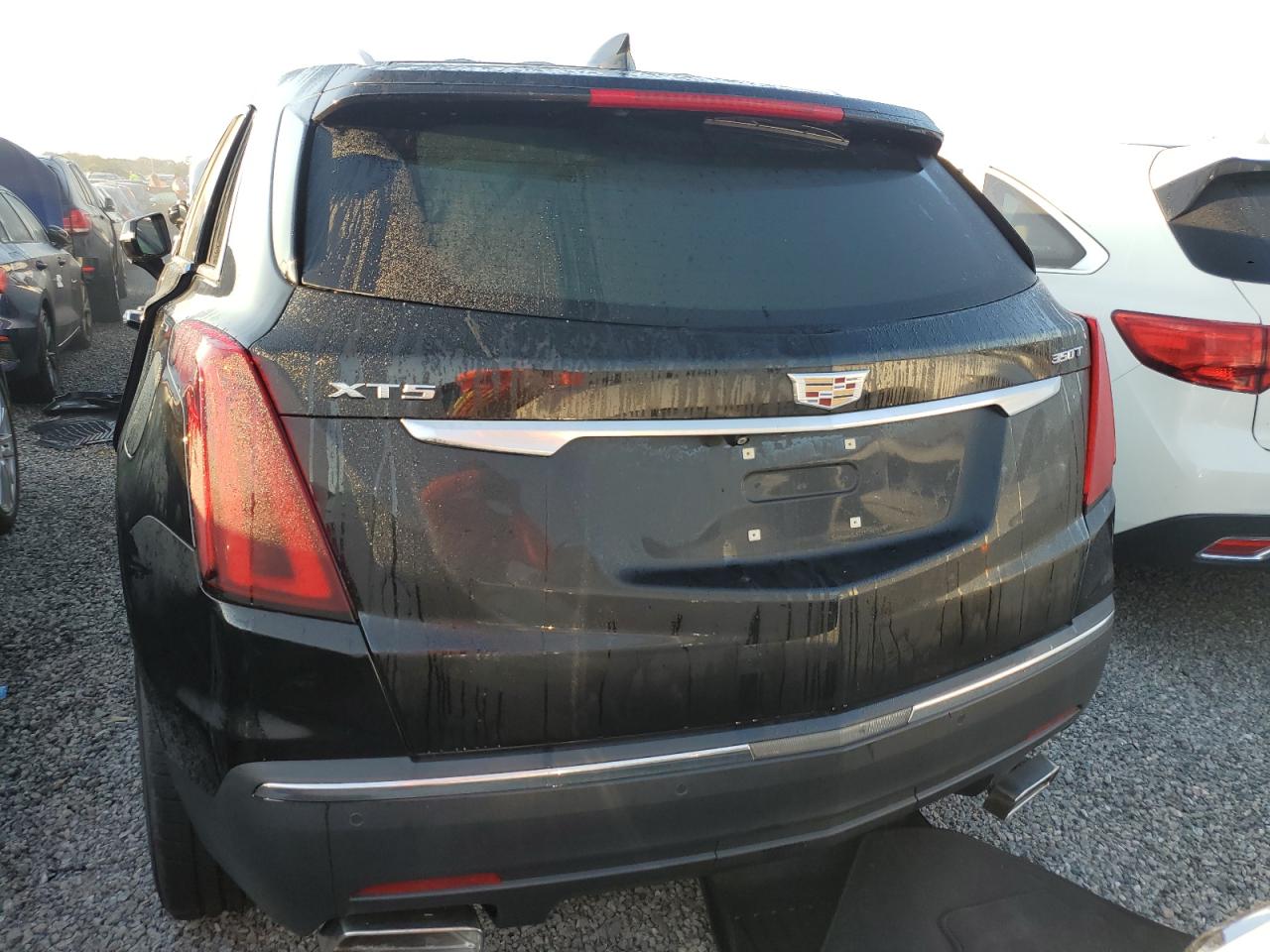2022 Cadillac XT5 VIN 1GYKNAR47NZ100986 Copart auction photo, water/flood damage thumbnail 6