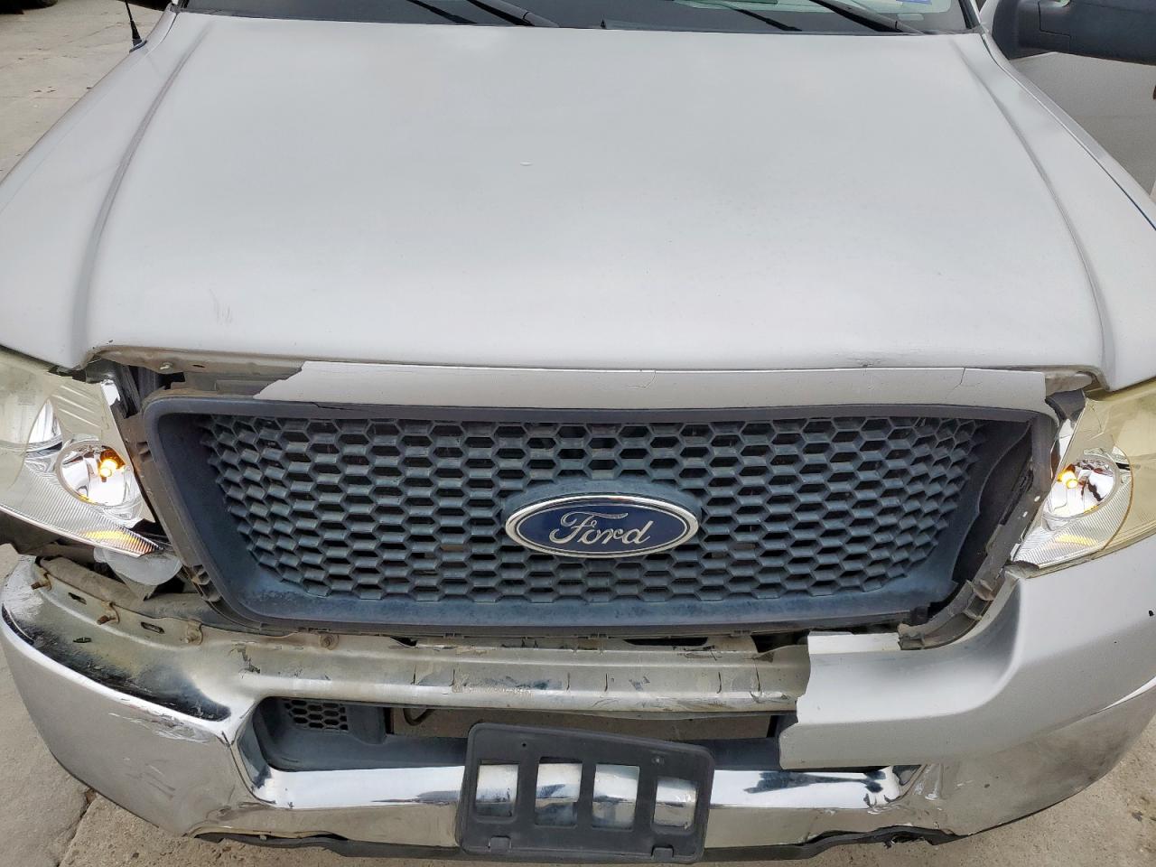 2005 Ford F-150 VIN 1FTPW12595FA60553 Copart auction photo, front end damage thumbnail 11