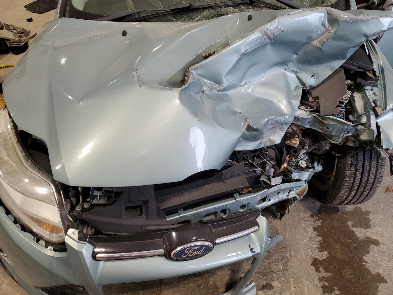 2012 Ford Focus VIN 1FAHP3M24CL200187 Copart auction photo, front end / side damage thumbnail 11