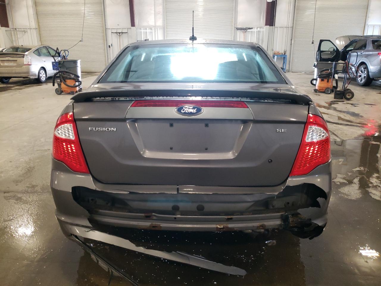 2012 Ford Fusion VIN 3FAHP0HA4CR130711 Copart auction photo, front end / rear end damage thumbnail 6