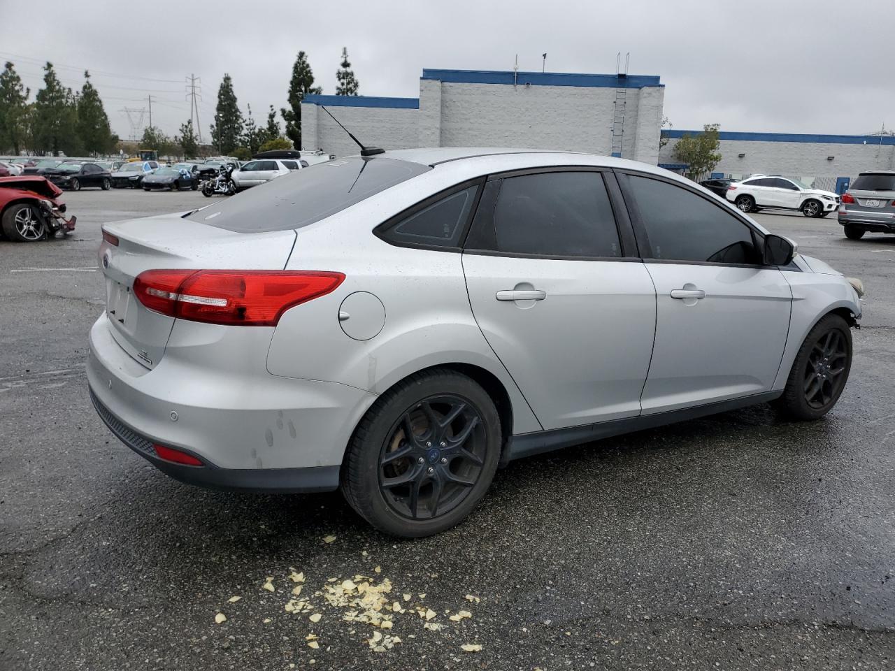 2016 Ford Focus VIN 1FADP3F23GL281569 Copart auction photo, front end damage thumbnail 3