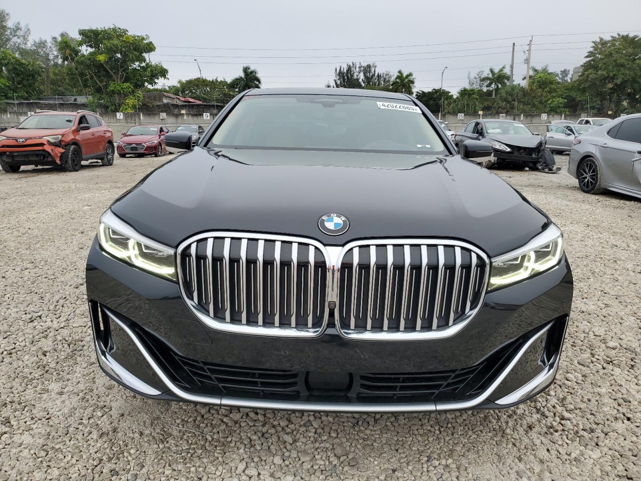 2022 BMW 7er VIN WBA7U2C02NCJ27538 Copart auction photo, side / undercarriage damage thumbnail 5