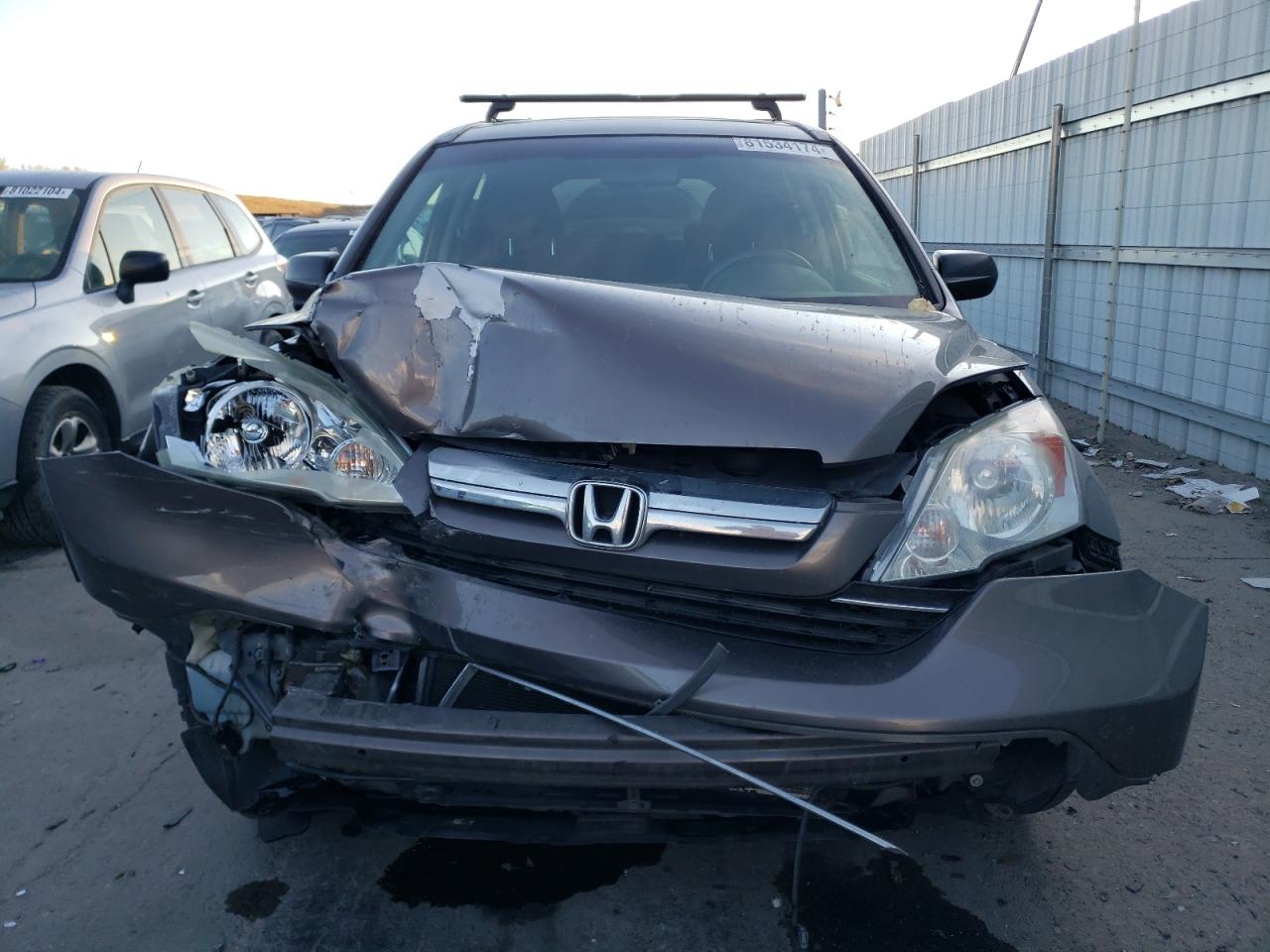 2009 Honda CR-V VIN 3CZRE48509G707652 Copart auction photo, front end / undercarriage damage thumbnail 5