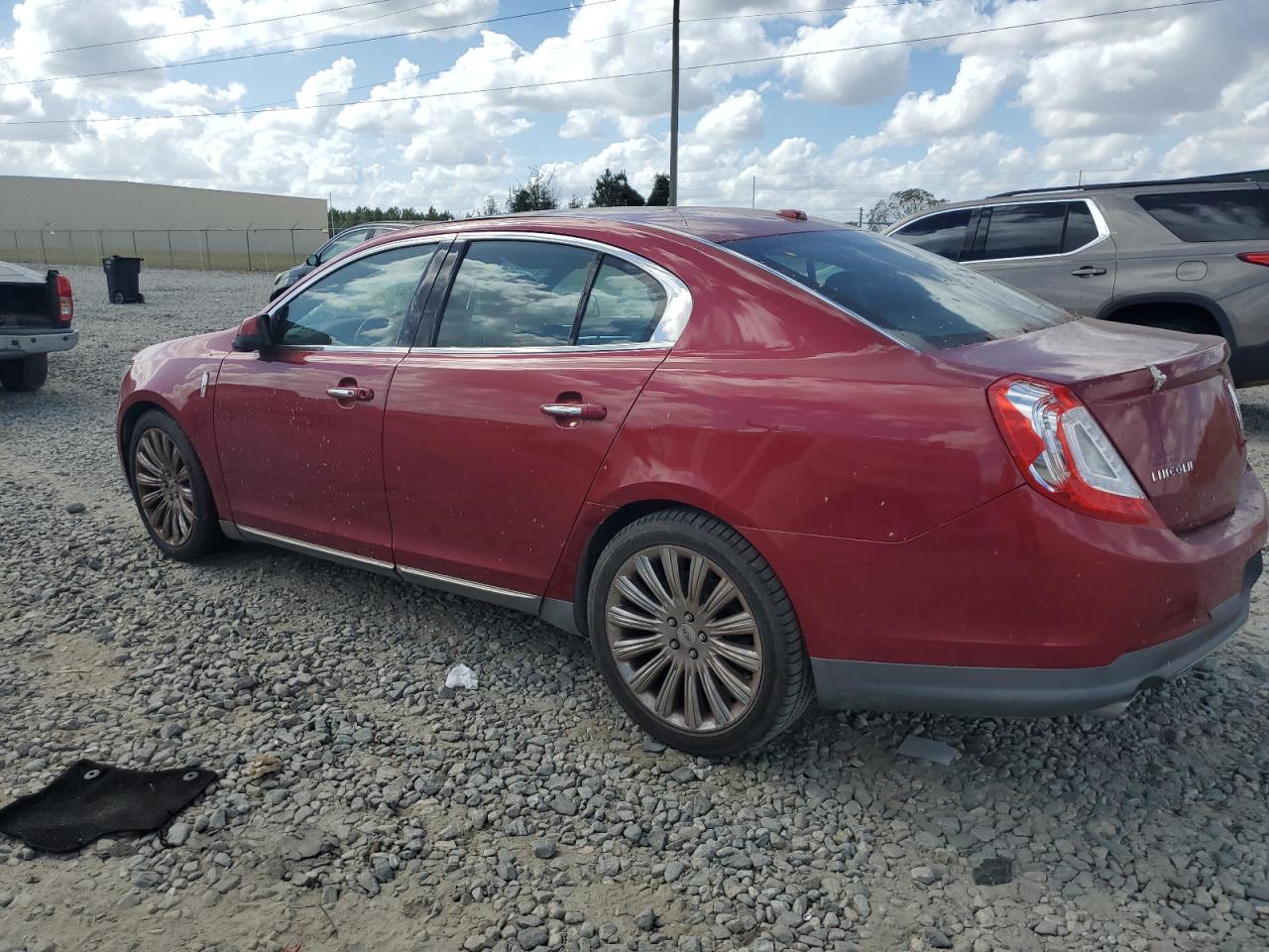 2014 Lincoln MKS VIN 1LNHL9DK3EG603755 Copart auction photo, all over damage thumbnail 2