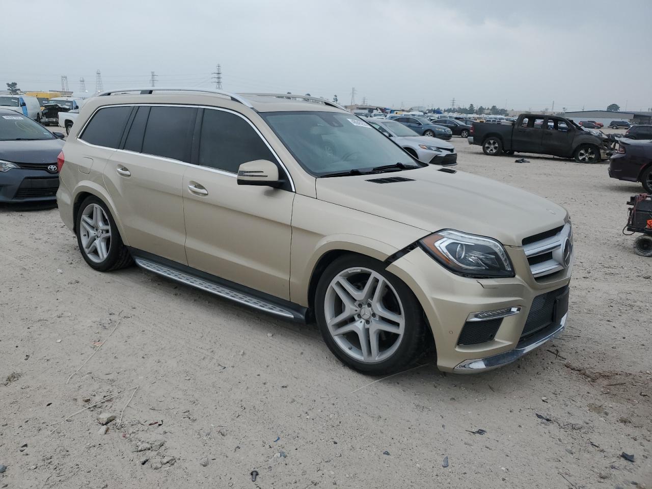 2013 Mercedes-Benz GL-klasse VIN 4JGDF7DE7DA138385 Copart auction photo, front end / minor dent/scratches damage thumbnail 4