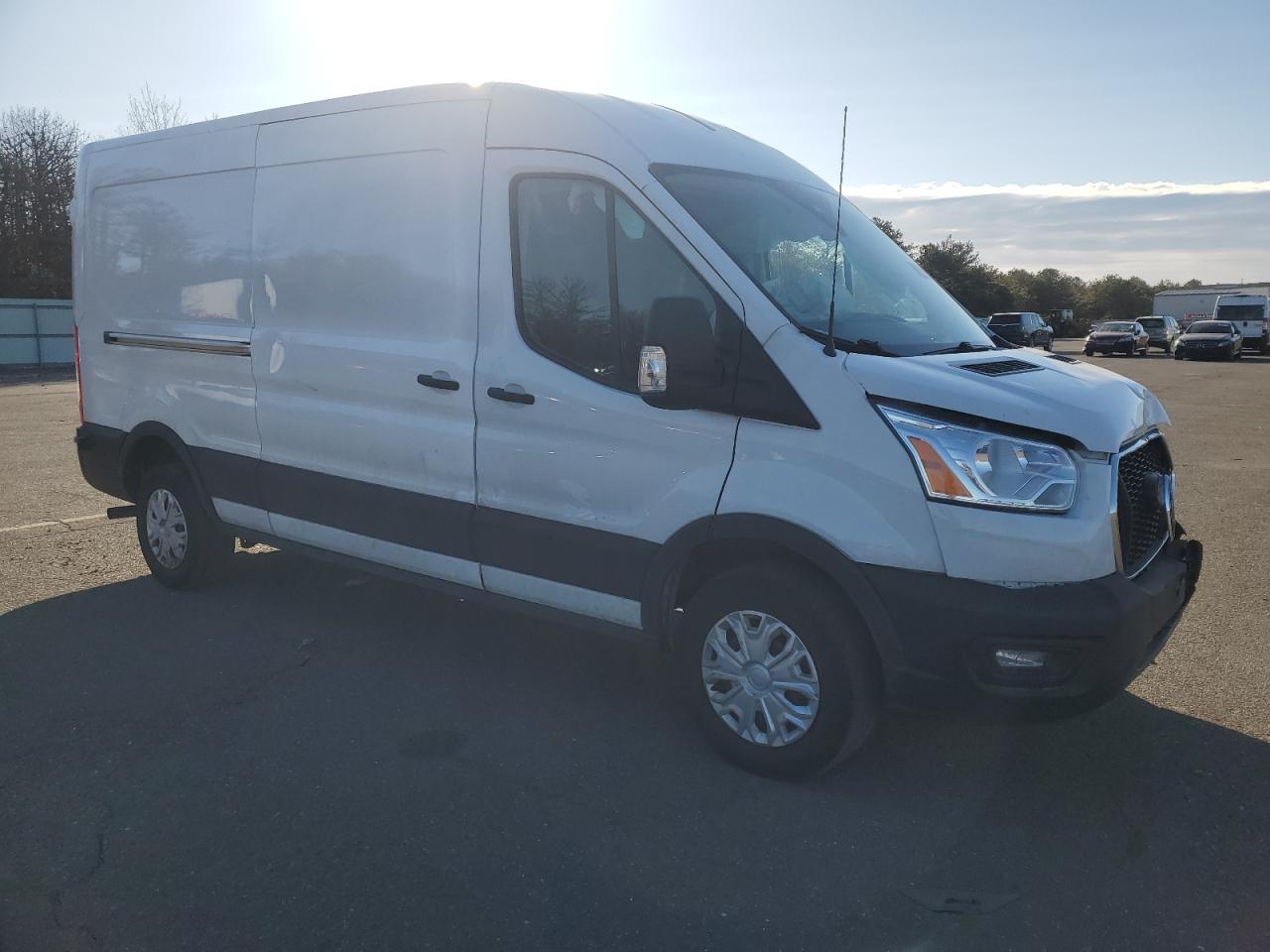 2021 Ford Transit VIN 1FTBR1C81MKA19401 Copart auction photo, front end / side damage thumbnail 4