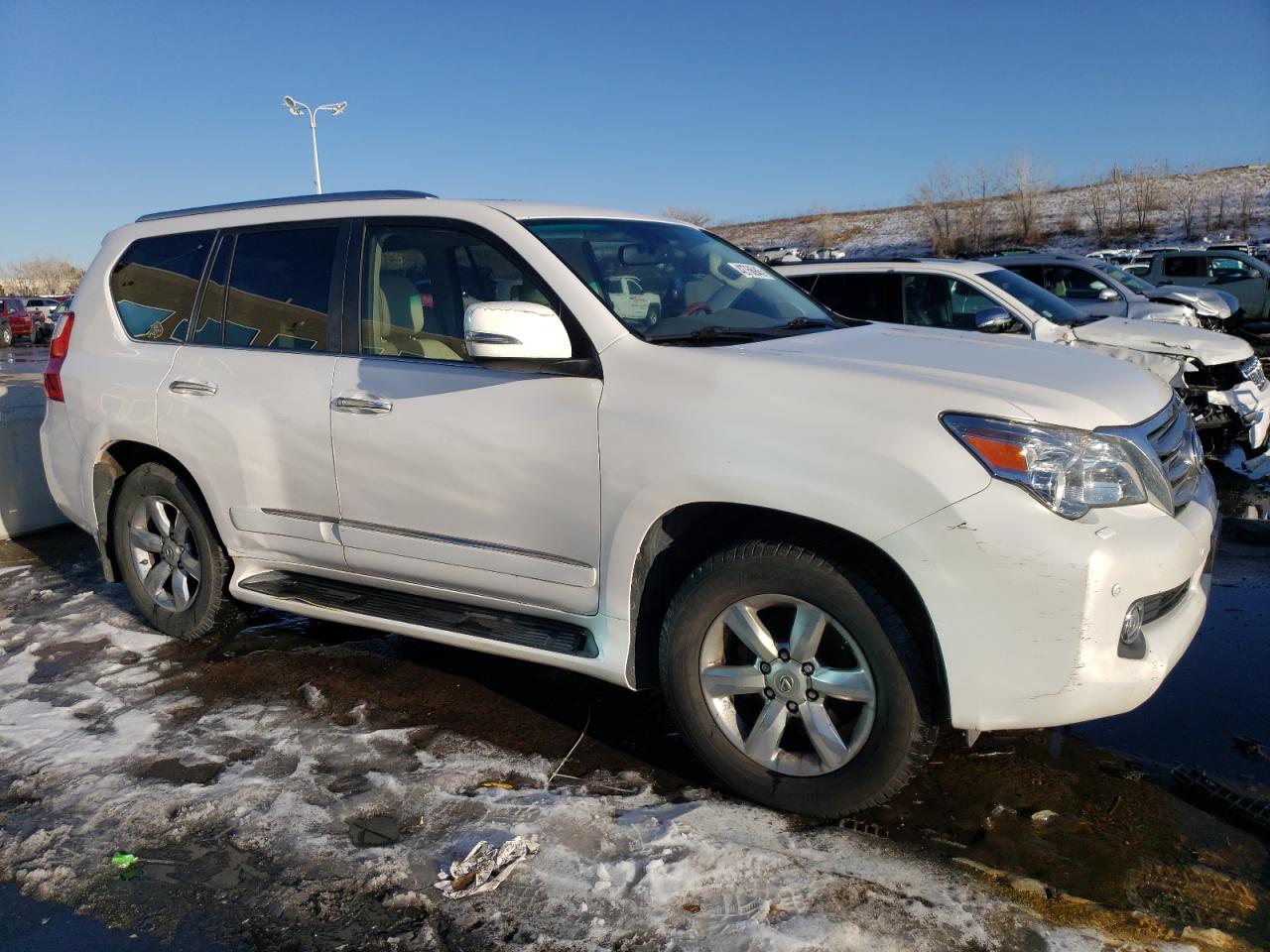 2012 Lexus GX VIN JTJJM7FX8C5043897 Copart auction photo, side / rear end damage thumbnail 4